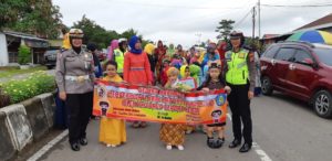 Satlantas Polres Lamandau Kawal Pelaksanaan Gebyar Karnaval Anak Usia Dini