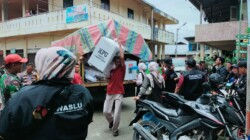 Bawaslu Sawahlunto dan Jajaran Fokus Awasi Distribusi Logistik Surat Suara Meski Sempat Diguyur Hujan,